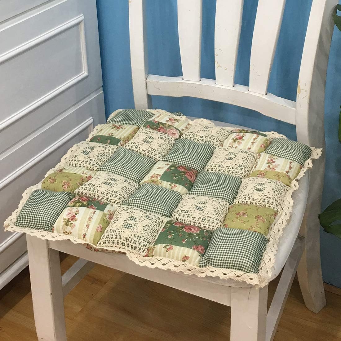 Patchwork lace-trimmed chair cushion