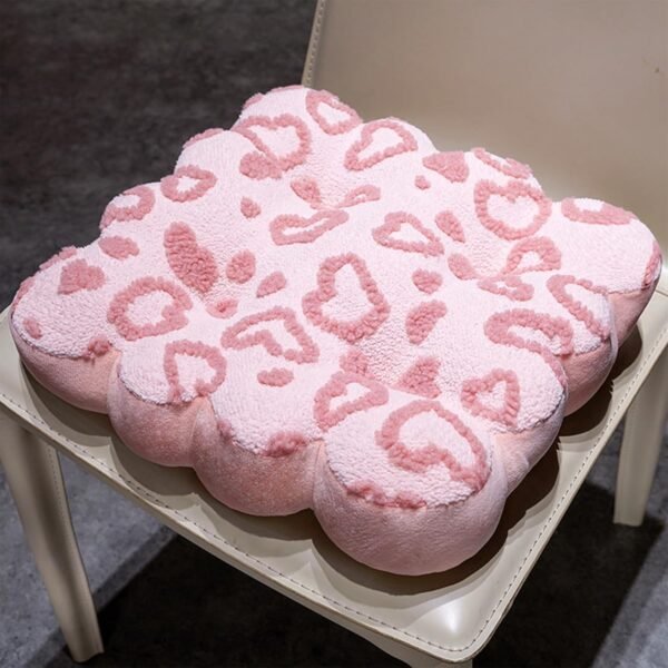 Chair cushion with heart decoration